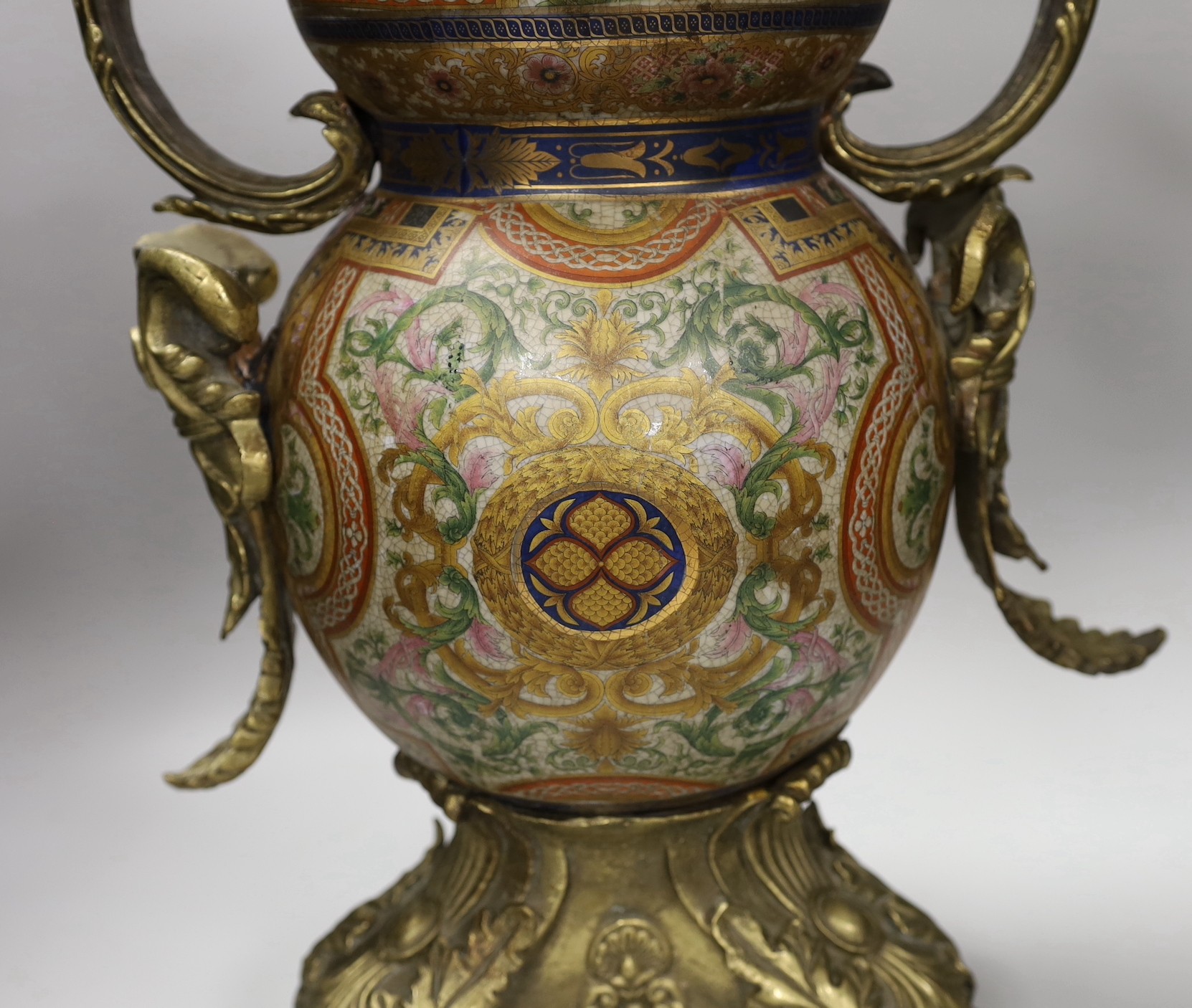 A large Louis XV-style ormolu-mounted ceramic urn. 69.5cm high